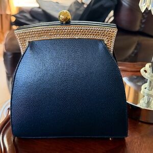 Stunning navy leather cocktail bag